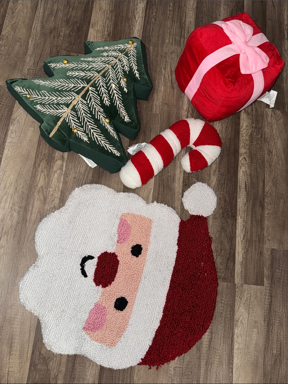 3 Christmas throw pillows & 1 Santa bath mat.